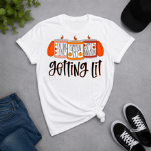 Load image into Gallery viewer, Getting Lit fall candle graphic tee with pumpkin spice and apple cinnamon
