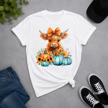 Load image into Gallery viewer, Highland cow pumpkin graphic tee with blue pumpkins and sunflowers
